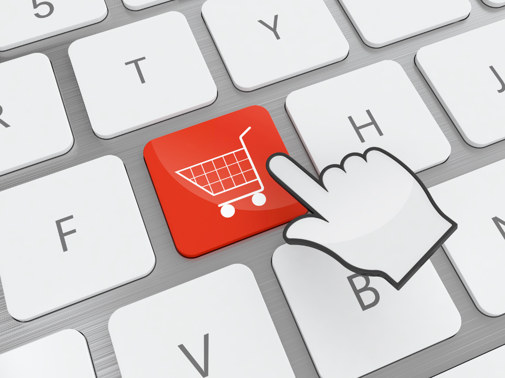 Illustrert AI bilde av et tastatur med en rød handlekurv-knapp, og med en musepeker på knappen.