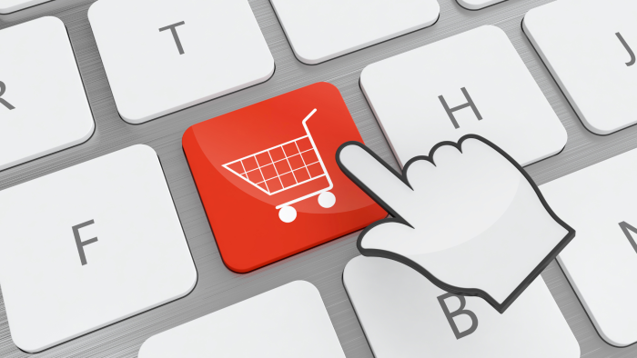 Illustrert AI bilde av et tastatur med en rød handlekurv-knapp, og med en musepeker på knappen.